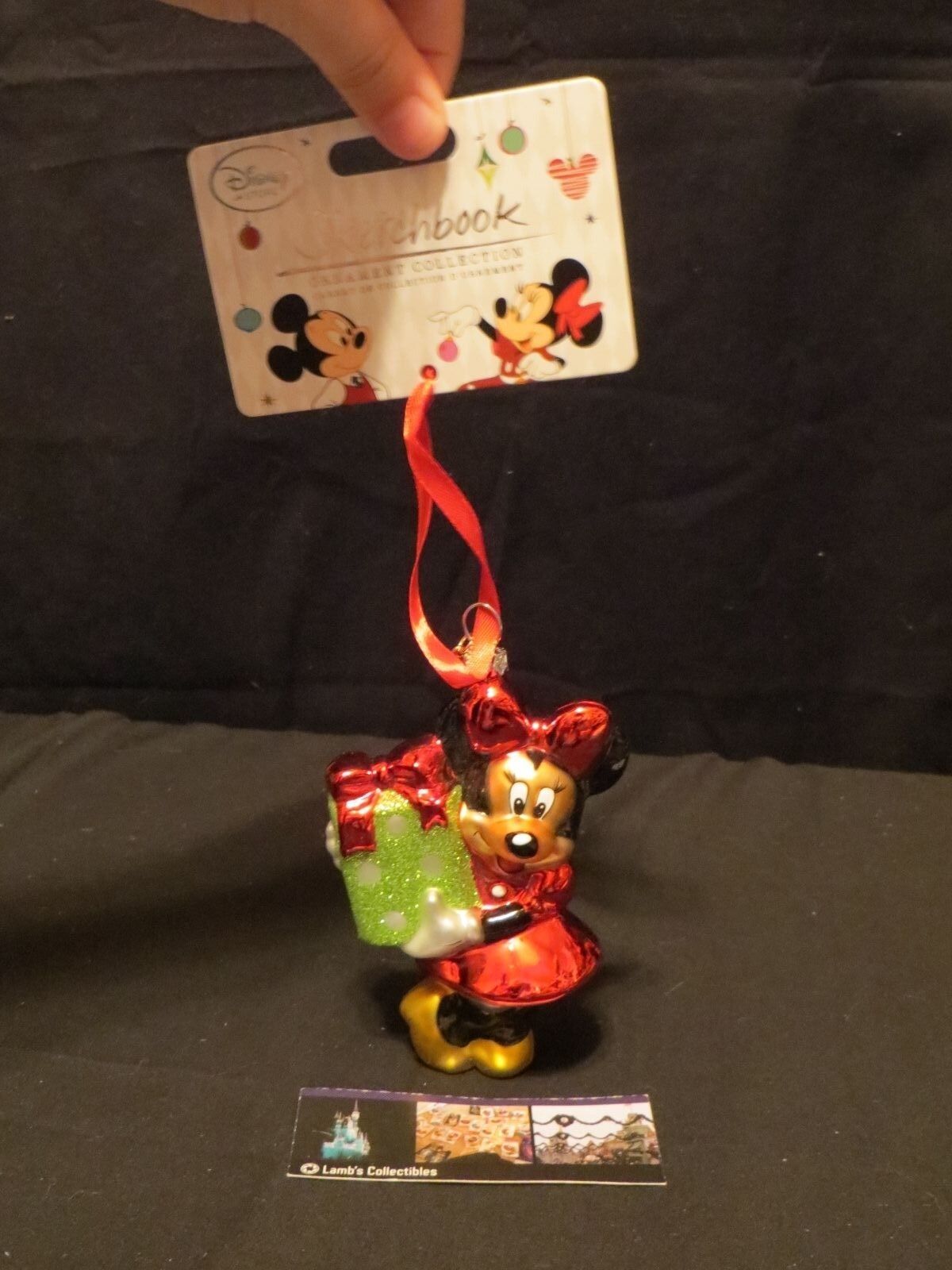 Minnie Mouse holding Christmas present Disney Store Sketchbook glass Ornament - $24.21
