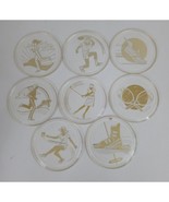 Vintage Set of 8 Clear &amp; Gold Tone Olympic Sports Theme Plastic Coasters - $24.74
