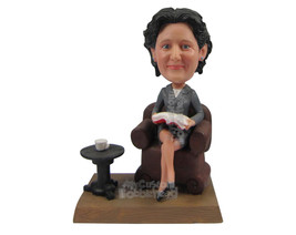 Custom Bobblehead Lady Wearing Jacket Sitting On A Couch Reading A Book And Havi - £135.06 GBP