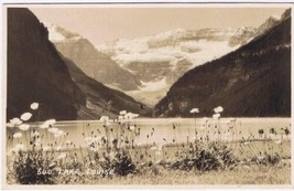 Postcard RPPC Lake Louise Spring Flowers Alberta Byron Harmon Along The ... - £3.88 GBP