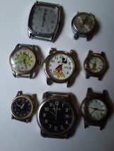 Lot of 8 Wrist Watch Faces Mickey Mouse, Alice, Tweety Bird For Parts Repair - $12.99