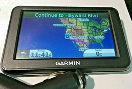 GARMIN NUVI 40 GPS NAVIGATOR BUNDLE WITH CAR CHARGER - $22.14