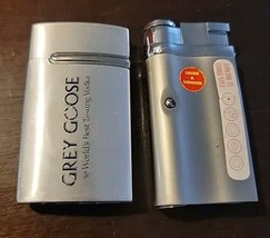 Lot Of Two Unique Lighters Grey Goose And Laser Lighter - $29.69