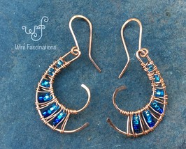 Handmade copper earrings: nautilus curve with wire weave and blue beads - £25.57 GBP