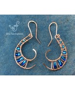 Handmade copper earrings: nautilus curve with wire weave and blue beads - €27,39 EUR