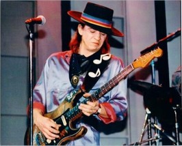 Stevie Ray Vaughan in concert 8x10 inch press photo Stevie playing guitar - £16.02 GBP