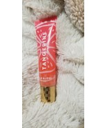 Tangerine lip gloss - $204.20 MXN