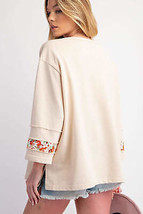 Beige Flower Patch Graphic Exposed Seam Wide Sleeve Top - $33.99