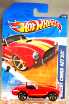 2011 Hot Wheels #107 Muscle Mania 7/10 SHELBY COBRA 427 S/C Red Clear-Window MC5 - £9.00 GBP