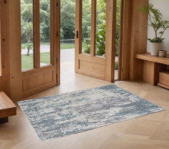 2&#39; X 3&#39; Gray and Ivory Abstract Area Rug - $1,340.97 MXN