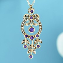 Natural Amethyst and Pearl Vintage Style Floral Ribbon Pendant in Solid 9K Gold - £719.28 GBP