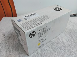 New HP LaserJet CE402YC Yellow Toner Cartridge TORN Box - $85.50