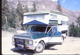 35 mm color slide * CHEVROLET PICK UP in bed CAMPER trees mountains 1970's? - $5.50