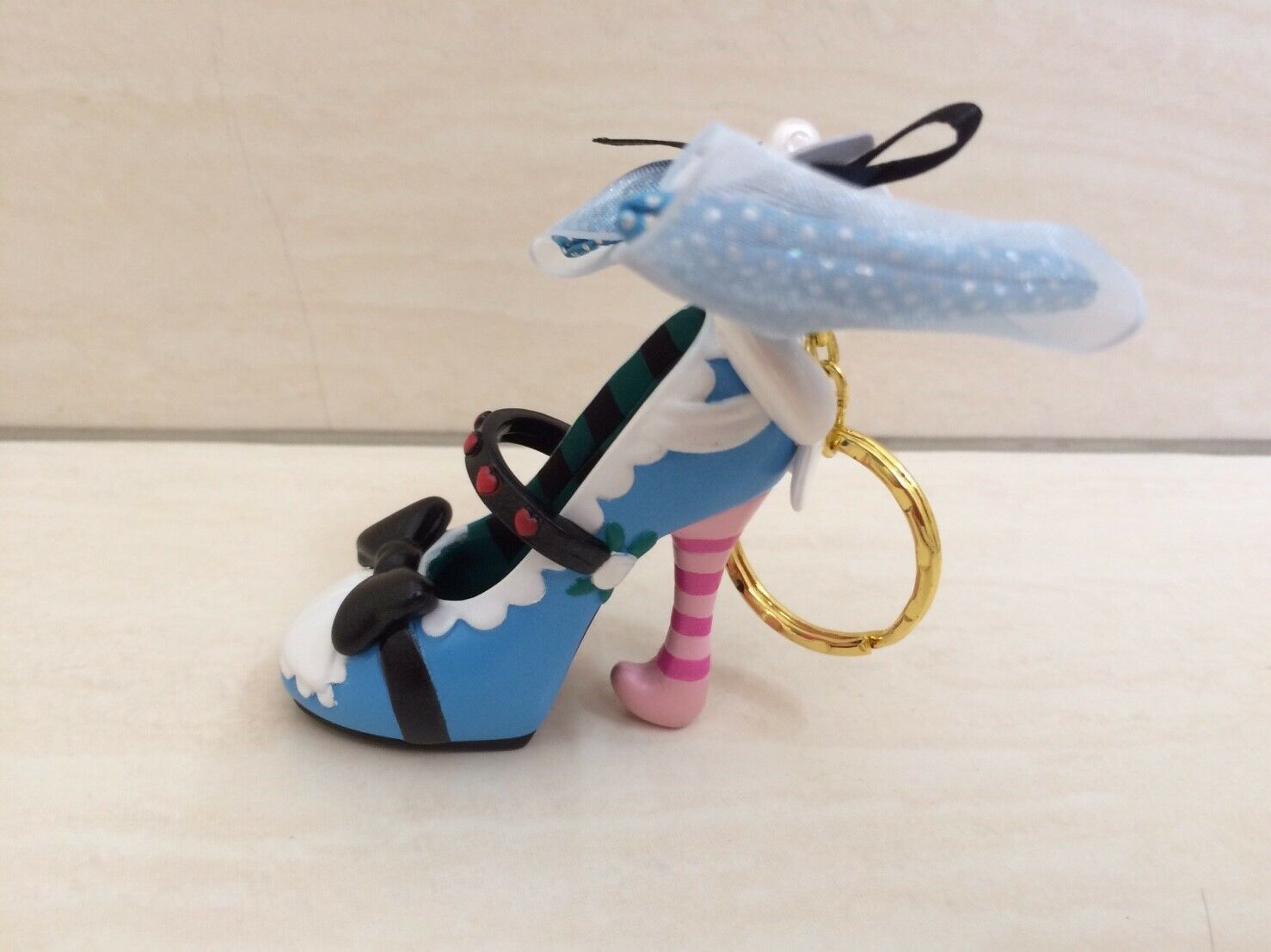 Primary image for Tokyo Disney Resort Alice in Wonderland Shoe Keychain. Very pretty NEW