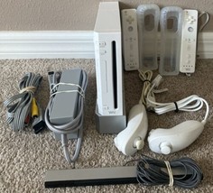 Nintendo Wii Console - White (Two controllers + Two Nunchucks)  - £39.87 GBP