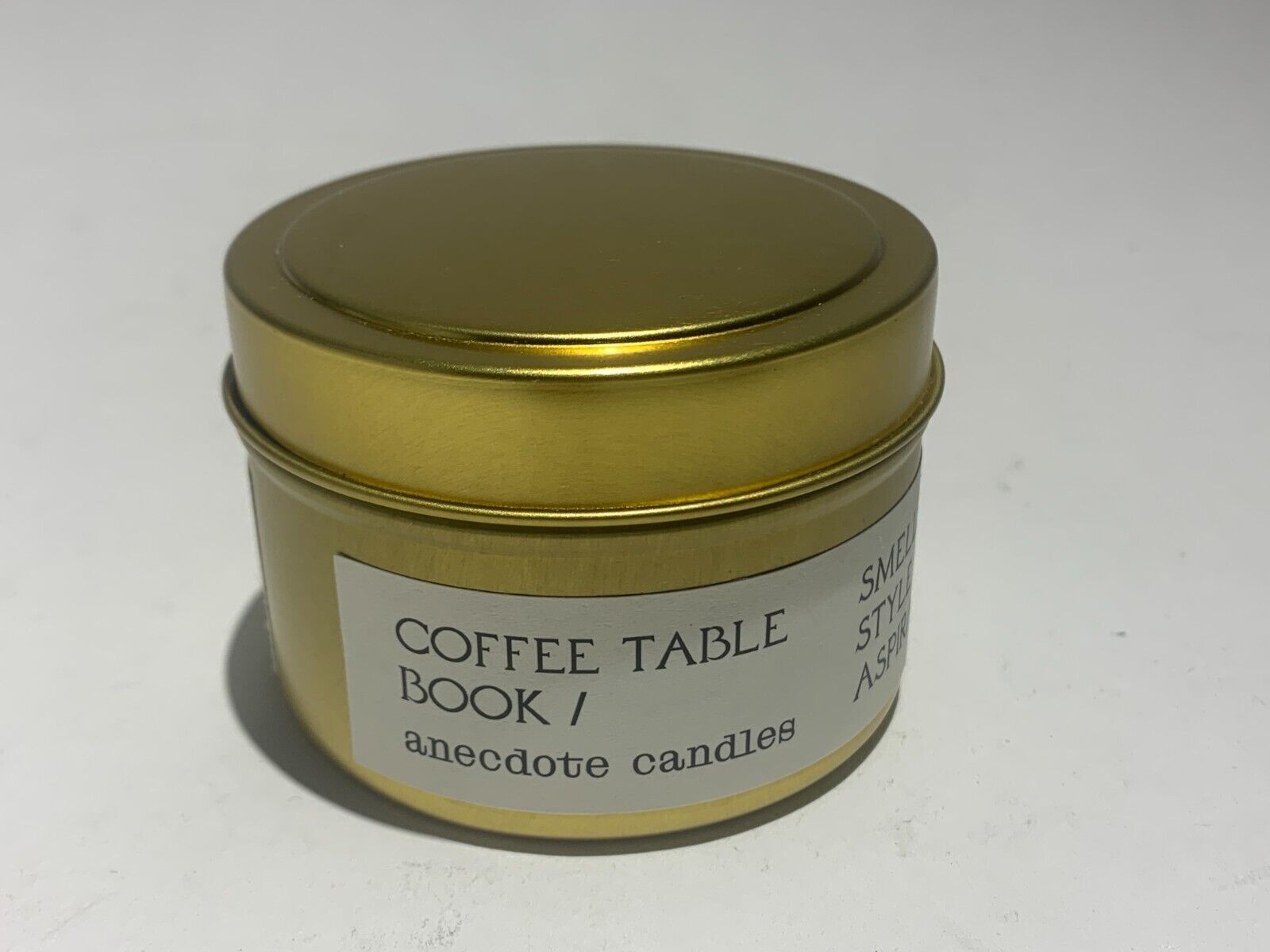 COFFEE TABLE BOOK / ANECDOTE CANDLES Vetiver and Citrus /  NEW DENTED TRAVEL TIN - $14.00
