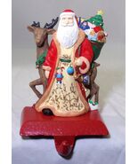 VINTAGE RESIN &amp; CAST IRON SANTA CHRISTMAS STOCKING HANGER NEW w/ DEFECT - $488.61 MXN
