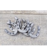 12 CAST IRON HORSESHOES CRAFTS HOME DECOR HORSESHOE HORSE SHOE SMALL TIN... - $17.49
