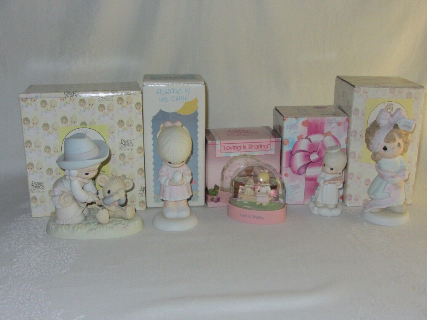 Primary image for Lot of 4 Precious Moments Figurines & 1 Snow Globe Bear Loving Angel Give