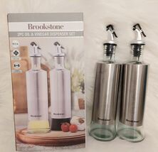BROOKSTONE 2 pc Oil &amp; Vinegar Dispenser Set Glass &amp; Stainless Steel Set - $234.30 MXN