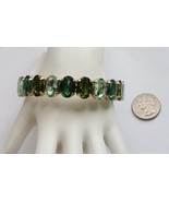 Erica Lyons Golden Bangle Bracelet with Faceted Ovals in Shades of Green - £6.31 GBP
