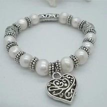 Charming Heart Pearl And Silver Bracelet - $39.67