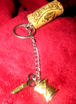 handmade WINE CORK KEY CHAIN w/gold colored needle/thread, black/silver ... - $5.00