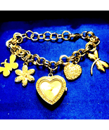 Beautiful vintage bongo heart charm bracelet watch - $602.15 MXN