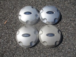 Genuine 2002  2003 Ford Explorer alloy wheel hubcaps center caps 1L24-1A... - $37.05