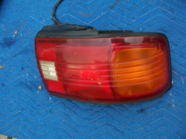 1992 1993 1994 PROTEGE RIGHT TAILLIGHT BRAKE TURN LIGHT OEM USED ORIGINA... - $2,669.42 MXN