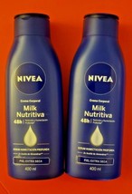 2 PACK NEW FORMULA NIVEA BODY MILK EXTRA DRY 400 ML EACH - £24.84 GBP