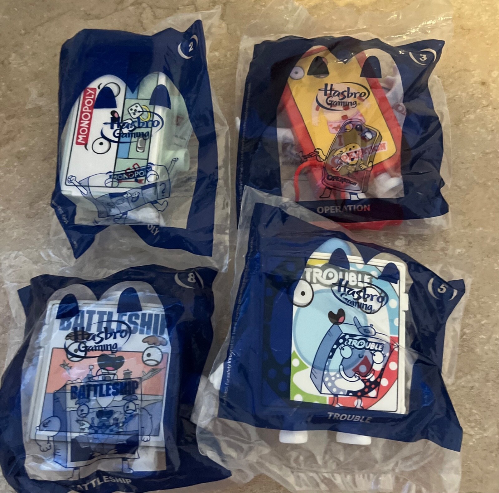 2020 McDonald&#39;s Hasbro Happy Meal Toys/Games - UNOPENED LOT of (4) - £6.78 GBP