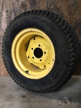 AM104008 John Deere Rear Wheel and Tire 23X10.5-12 from JD 320 Hydraulic... - $52.79