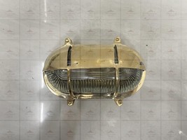 Stylish Nautical Oval Wall Sconce - Brass Casting Bulkhead Light for Patio - $198.00