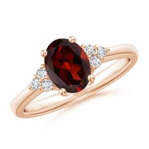 ANGARA Solitaire Oval Garnet Ring with Trio Diamond Accents in 14K Gold - £736.20 GBP