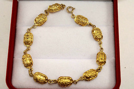 Única pulsera egipcia escarabajo estampado oro amarillo de 18 quilates... - $797.68
