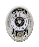 Moving Face Pendulum Wall Clock - Plays Melodies Every Hour - $15,112.32 MXN