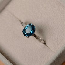 7x9mm Oval Cut Lab-Created London Blue Topaz Solitaire Engagement Ring in 925 - £71.17 GBP