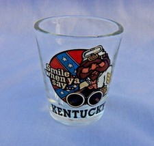 SOUVENIR SHOT GLASS   SMILE WHEN YOU SAY KENTUCKY w MAN HOLDING DOUBLE B... - $9.85