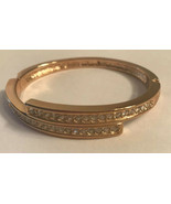 Roman signed Gold toned Overlap Bracelet with CZ stones - $20.40 CAD