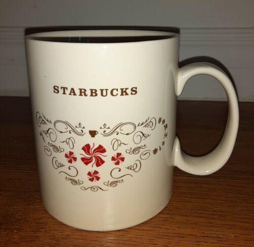 Primary image for Starbucks Christmas Coffee Mug 18oz Beige and Red Candy Swirls