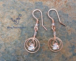 Handmade copper earrings: circle wire wrapped copper lined crystal glass beads - £18.22 GBP