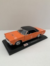 Maisto 1965 Pontiac GTO 1:18 Diecast Orange Car Figure - £45.60 GBP