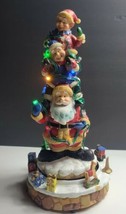 Vintage Santa Elves Totem Pole wrapped in Crhistmas Lights Musical Figurine READ - £22.85 GBP