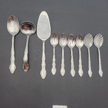Vintage Carlyle Grapefruit Stainless Hong Kong flower Set of 9 - $24.07