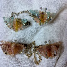 Sweater clips butterfly plastic with sparkles, two pair, marked pat 2853761 - $25.00