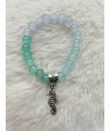 Green, blue, grey glass bead bracelet with seahorse charm. - $8.23 CAD
