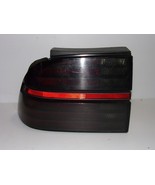 1988 88 Chevrolet Beretta Tail Light OEM 16506029 LH DS Smoked 1987 87 - $1,427.00 MXN