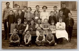 RPPC School Children Class Photo Handsome Teacher Frowning Faces Postcard E29 - £10.35 GBP