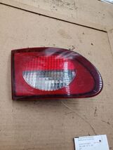 Driver Left Tail Light Lid Mounted Fits 00-02 CAVALIER 320688 - $18.86